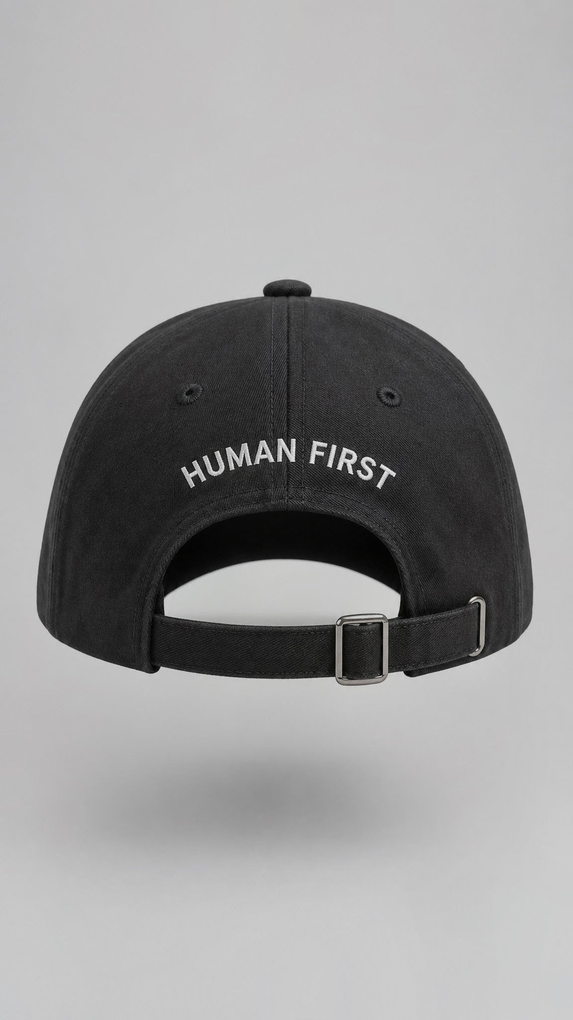 MADE FOR HUMANS cap in Black — back, Human First embroidery